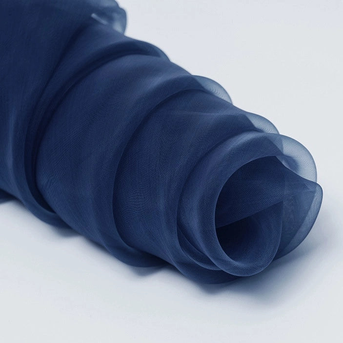 A close-up of Longan Craft's Silky Polyester Organza Fabric By The Yard, a premium solid color organza with a soft, sheer texture—ideal for elegant bridal or evening wear.