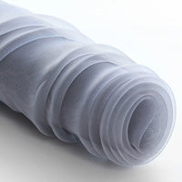 A close-up of Longan Craft's Silky Polyester Organza Fabric by the Yard—premium, soft, and sheer bridal organza material in light gray—showing its delicate texture, perfect for elegant evening dresses or bridal gowns.