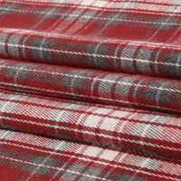 Close-up of folded Longan Craft Single Sided Sueded Plaid Flannel Fabric By The Yard, featuring a red, white, and gray plaid pattern. The medium weight polyester cotton blend and the sueded texture of this premium soft flannel clothing material are clearly visible.