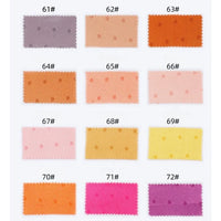 Twelve Longan Craft Small Polka Dot Jacquard Satin Fabric swatches (#61–72), in purple, peach, orange, pink, and yellow shades with zigzag edges, are displayed in a 3x4 grid on a white background.