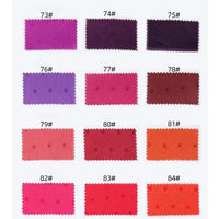 Fourteen rectangular swatches of Longan Craft’s Small Polka Dot Jacquard Satin Fabric by the yard, in purple, pink, red, and orange shades (numbered 73#-84#), are grid-arranged on white to showcase this cozy textured satin for clothing.