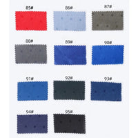 Twelve rectangular swatches of Longan Craft's Small Polka Dot Jacquard Satin Fabric By The Yard are shown in three rows, numbered 85#–95#, displaying multicolor dots on shades like red, blue, grey, black, and dark green.