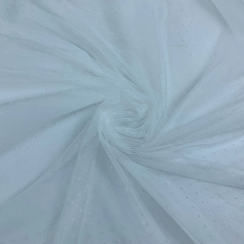 Close-up of Longan Craft Small Polka Dot Tulle Fabric by the Yard—a soft, colorful polyester tulle with delicate dots, gathered and swirled at the center. Its airy texture is ideal for dresses, veils, or adding elegance to wedding attire.
