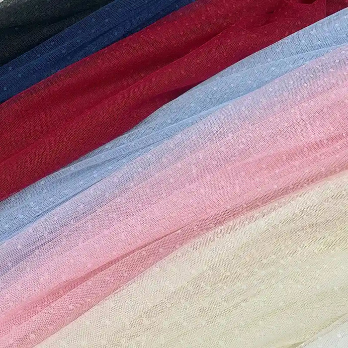 Longan Craft’s Small Polka Dot Tulle Fabric by the Yard features soft, colorful polyester tulle in black, red, light blue, pink, and cream—ideal for dresses, veils, or adding a unique touch to special occasion outfits.