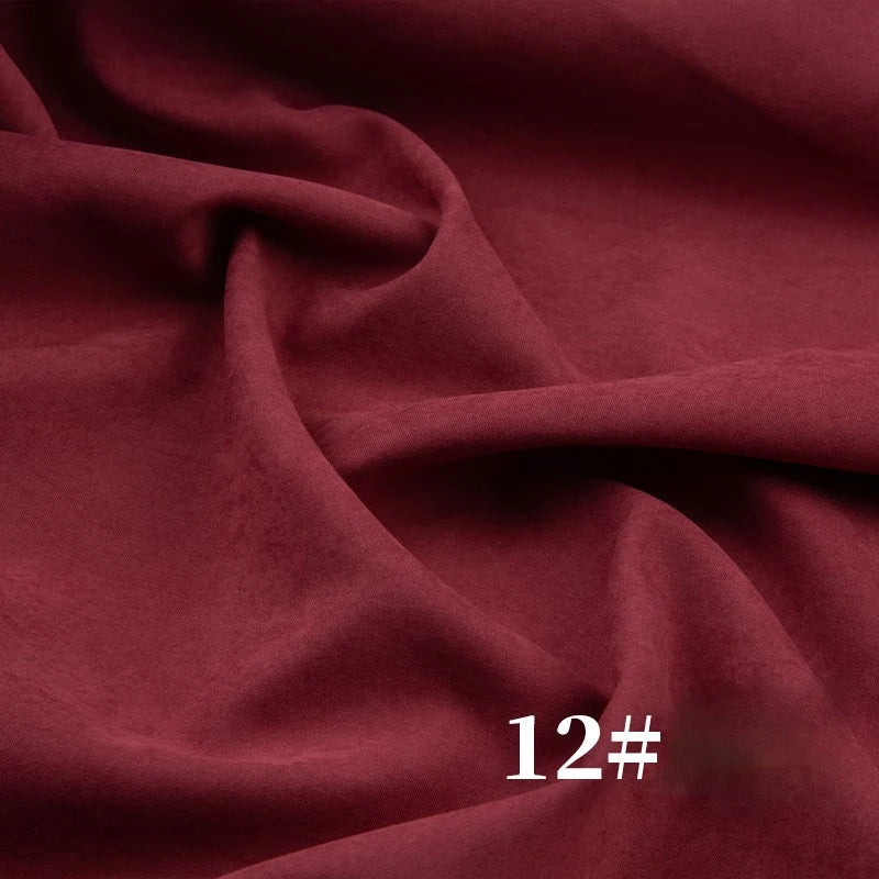 A close-up of Longan Craft’s Solid Color Brushed Polyester Peachskin Fabric shows its rich burgundy shade and velvety texture, perfect for dressmaking. The number 12# appears in white at the lower right corner.