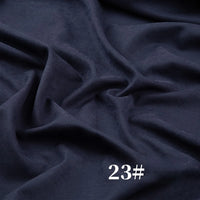 Longan Craft’s Solid Color Brushed Polyester Peachskin Fabric by the Yard in dark navy offers a soft, velvety texture and midweight feel—perfect for dressmaking. "23#" appears in white at the lower right of the fabric.