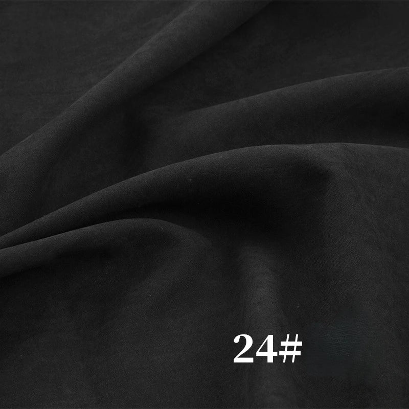 Close-up of Longan Craft’s Solid Color Brushed Polyester Peachskin Fabric by the Yard, midweight microsuede with a velvety, matte finish and soft folds. White “24#” appears in the lower right corner.