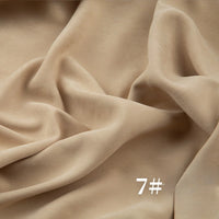 A close-up of Longan Craft’s Solid Color Brushed Polyester Peachskin Fabric By The Yard shows its soft, velvety folds and midweight microsuede texture, with the number 7# in white at the bottom right corner.
