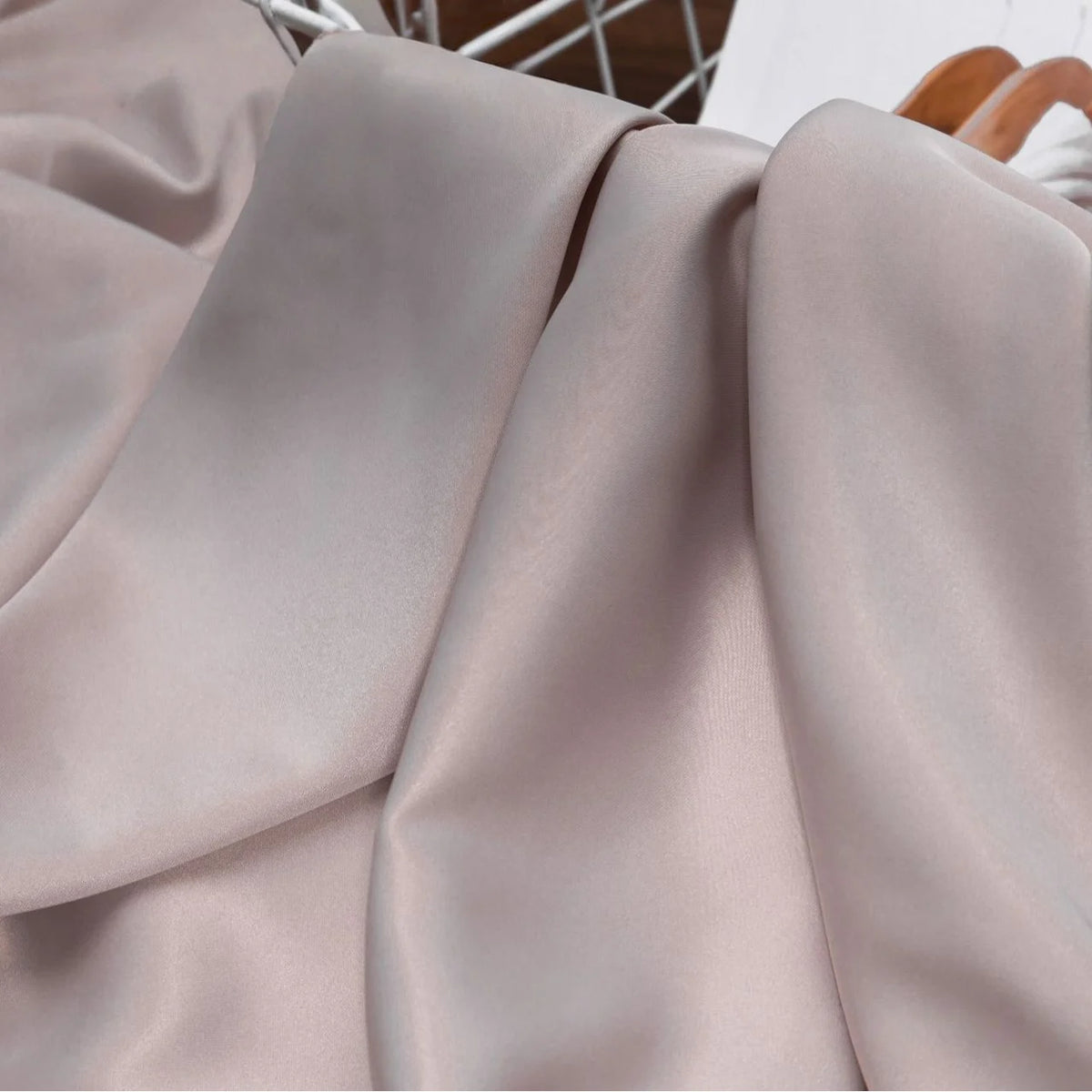 A close-up of Longan Craft's Solid Color Charmeuse Satin Fabric by the Yard, featuring thick bridal satin texture and a smooth, shiny finish—ideal for gowns and luxurious dress fabric projects.