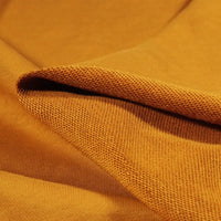 Close-up of Longan Craft’s Solid Color Cotton French Terry Fabric By The Yard, showing its textured weave and both smooth outer and slightly rougher inner surfaces—thick, soft, and perfect for hoodies.