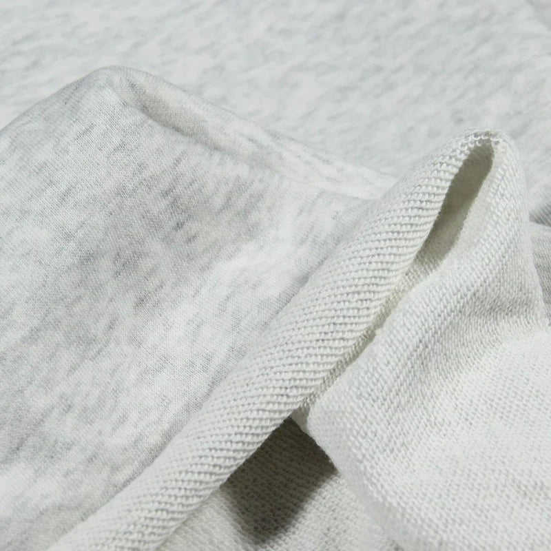 Close-up of Longan Craft’s Solid Color Cotton French Terry Fabric By The Yard, showing its thick, textured weave and soft feel—ideal material for hoodies and perfect for cozy, durable projects.