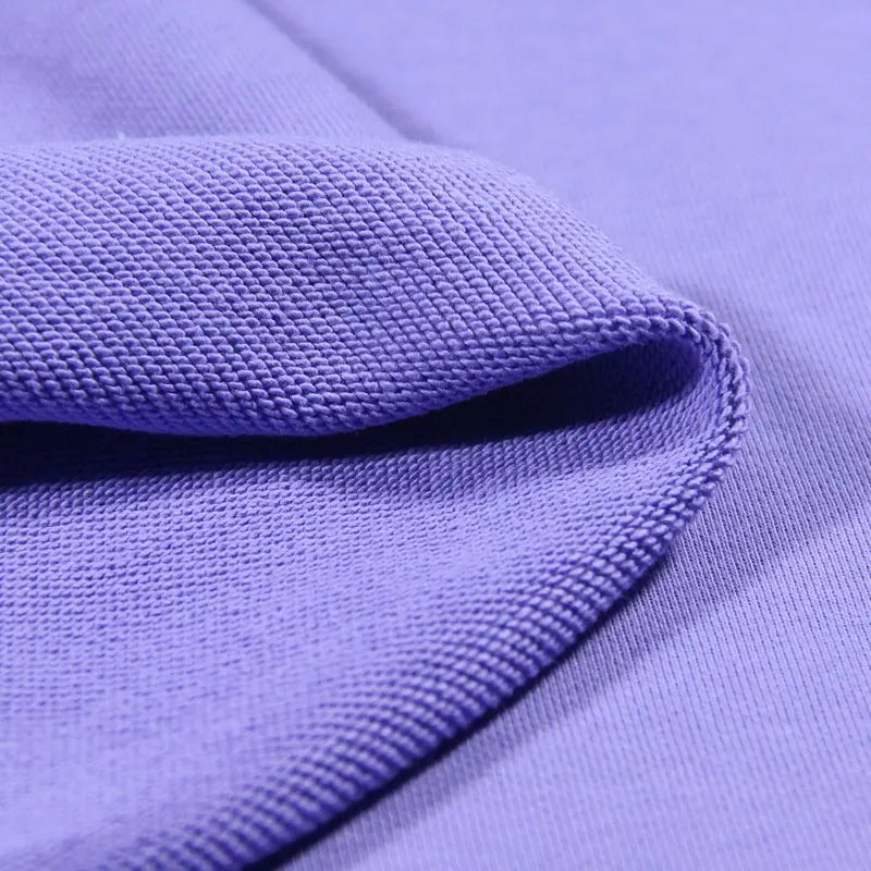 A close-up of Longan Craft Solid Color Cotton French Terry Fabric by the yard showcases its thick, textured weave and soft surface, making it ideal for hoodies.