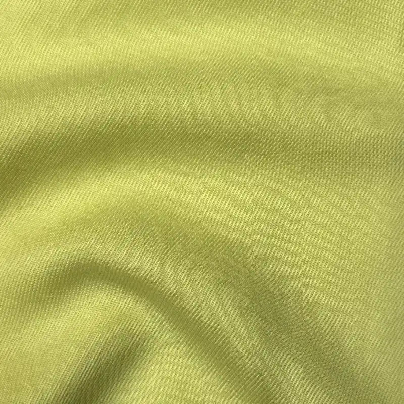 Close-up of Solid Color Denim Lyocell Fabric by the yard from Longan Craft—breathable, wrinkle-free material with a soft ribbed texture, ideal for comfy jeans and sustainable fashion projects.