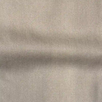 Close-up of Longan Craft’s Solid Color Denim Lyocell Fabric By The Yard, showcasing its diagonal twill weave and breathable, wrinkle-free texture—ideal for comfy jeans or sustainable fashion projects.