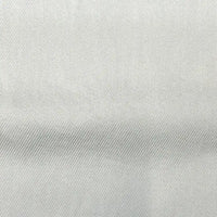 Close-up of Longan Craft’s Solid Color Denim Lyocell Fabric—breathable, wrinkle-free, and smooth with a diagonal twill weave. This comfy, off-white material by the yard is ideal for sustainable jeans and fashion projects.