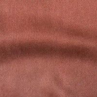 Close-up of Longan Craft’s Solid Color Denim Lyocell Fabric by the Yard shows fine diagonal lines and a soft matte surface—breathable, wrinkle-free, and comfy denim lyocell material perfect for sustainable jeans and eco-friendly fashion.