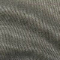 Close-up of Longan Craft Solid Color Denim Lyocell Fabric by the yard, featuring a taupe breathable, wrinkle-free denim material with a diagonal twill weave—ideal for comfy, sustainable jeans and fashion projects.