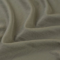 Close-up of Longan Craft's olive green Solid Color Double Sided Peachskin Fabric By The Yard, a soft microfiber polyester material with smooth peachskin texture and gentle folds, perfect for dresses.