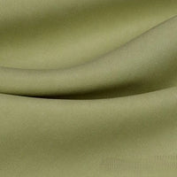 A close-up of Longan Craft's Solid Color Linen Lyocell Fabric By The Yard reveals light olive green, wrinkle-free twill lyocell with a soft texture, gentle folds, and a fine weave—sustainable and breathable for dresses.