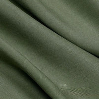 Close-up of Longan Craft’s Solid Color Linen Lyocell Fabric By The Yard features olive green, wrinkle-free twill with visible diagonal ribbing, soft flowing folds, and a smooth yet slightly textured sustainable surface.