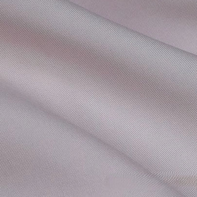 Close-up of Solid Color Linen Lyocell Fabric by Longan Craft, featuring smooth, light grey, wrinkle-free twill lyocell—sustainable and breathable for dresses, ideal for those seeking eco-friendly solid color fabric.