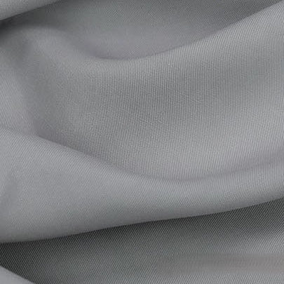 Close-up of Longan Craft’s Solid Color Linen Lyocell Fabric by the Yard, a wrinkle-free, sustainable twill with light gray color, gentle folds, and soft texture—ideal for breathable dresses.