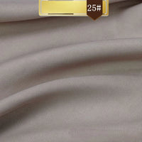 A close-up of Longan Craft’s Solid Color Linen Lyocell Fabric By The Yard in light taupe showcases its smooth, wrinkle-free twill texture and gentle folds; a brown box at the top displays “25#”.