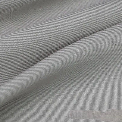 Close-up of Longan Craft's Solid Color Linen Lyocell Fabric By The Yard, a sustainable, wrinkle-free twill lyocell textile featuring fine diagonal lines, smooth texture, soft folds, and gentle shadows—ideal for breathable dresses.