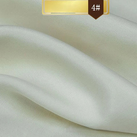 A close-up of Longan Craft's Solid Color Linen Lyocell Fabric by the yard shows smooth, wrinkle-free twill folds with a subtle sheen; a gold “4#” label appears at the top, highlighting this sustainable and breathable textile for dresses.