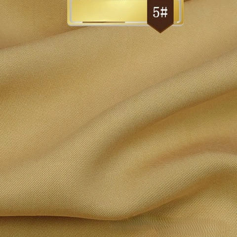 Longan Craft Solid Color Linen Lyocell Fabric by the Yard, wrinkle-free twill material in light brown/beige with a smooth, slightly textured surface. Sustainable, breathable textile for dresses. A small label at the top right reads 5#.