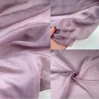 Four images display Longan Craft's Solid Color Linen Silk Fabric by the yard, a thin lyocell silk blend in light purple. The semi-sheer material looks soft and delicate, with one photo showing its luxurious texture and drape in hand.