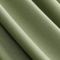 Close-up of olive green Solid Color Modal Jersey Fabric by the yard from Longan Craft, showing soft folds and subtle herringbone texture. This cotton spandex jersey textile is breathable and ideal for comfortable sleepwear.