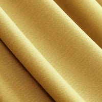 Close-up of Longan Craft Solid Color Modal Jersey Fabric by the yard, a soft, breathable cotton spandex jersey textile with smooth folds and drape—perfect for comfortable sleepwear.