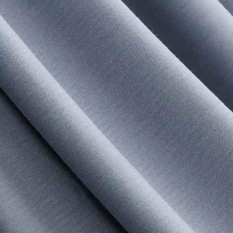 Close-up of Longan Craft Solid Color Modal Jersey Fabric By The Yard, a light grey cotton spandex jersey textile with a smooth, soft texture and gentle drape—breathable and ideal for sleepwear. Uniform color, tightly woven.