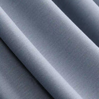 Close-up of Longan Craft Solid Color Modal Jersey Fabric By The Yard, a light grey cotton spandex jersey textile with a smooth, soft texture and gentle drape—breathable and ideal for sleepwear. Uniform color, tightly woven.