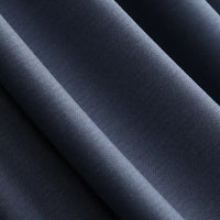 Close-up of Longan Craft Solid Color Modal Jersey Fabric by the yard, a cotton spandex blend with a soft texture and subtle sheen, featuring breathable material ideal for sleepwear and gentle diagonal folds.