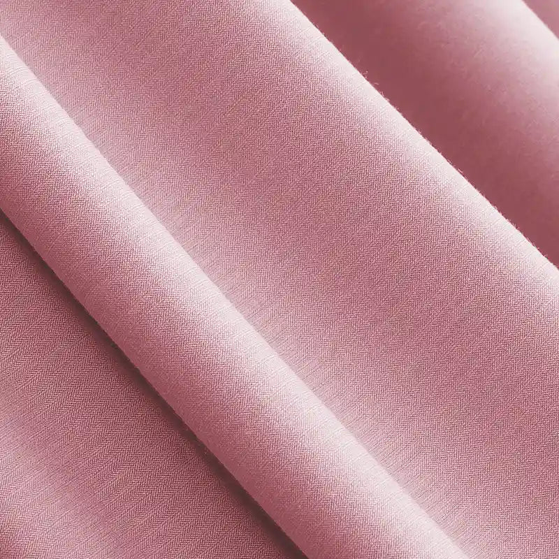 Close-up of Longan Craft's Solid Color Modal Jersey Fabric By The Yard—cotton spandex blend with a smooth, breathable texture and gentle sheen, ideal for kids’ sleepwear and other comfortable clothing projects.