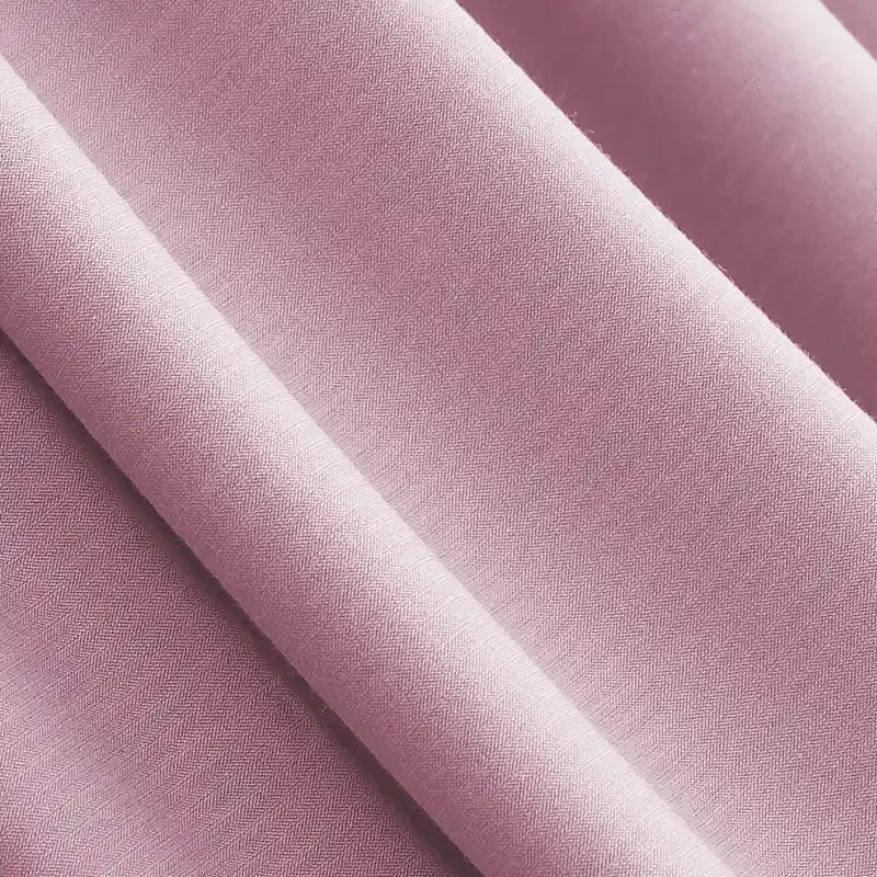 Close-up of Solid Color Modal Jersey Fabric By The Yard from Longan Craft, featuring soft pink cotton spandex jersey with a smooth, slightly matte texture—breathable and ideal for sleepwear or children’s clothing.