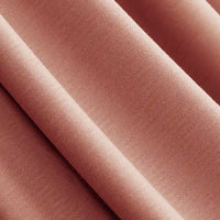 Close-up of Longan Craft Solid Color Modal Jersey Fabric by the yard in a muted rose, showing its soft, smooth texture and matte finish—an ideal breathable cotton spandex jersey textile for children's sleepwear and clothing projects.