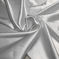 A close-up of Longan Craft’s Solid Color Polyester Satin Fabric by the yard, showing its silky stretch satin texture and soft, reflective surface—ideal material for blouses.
