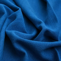 Close-up of soft, textured Solid Color Rayon Linen Fabric by Longan Craft, a thick washed slub viscose material with visible folds and creases—ideal for dresses and clothing projects by the yard.