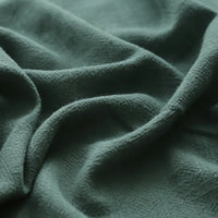 Close-up of Longan Craft’s Solid Color Rayon Linen Fabric By The Yard, a thick washed slub viscose material with soft texture, subtle pattern, and visible folds—ideal for dresses and clothing projects.