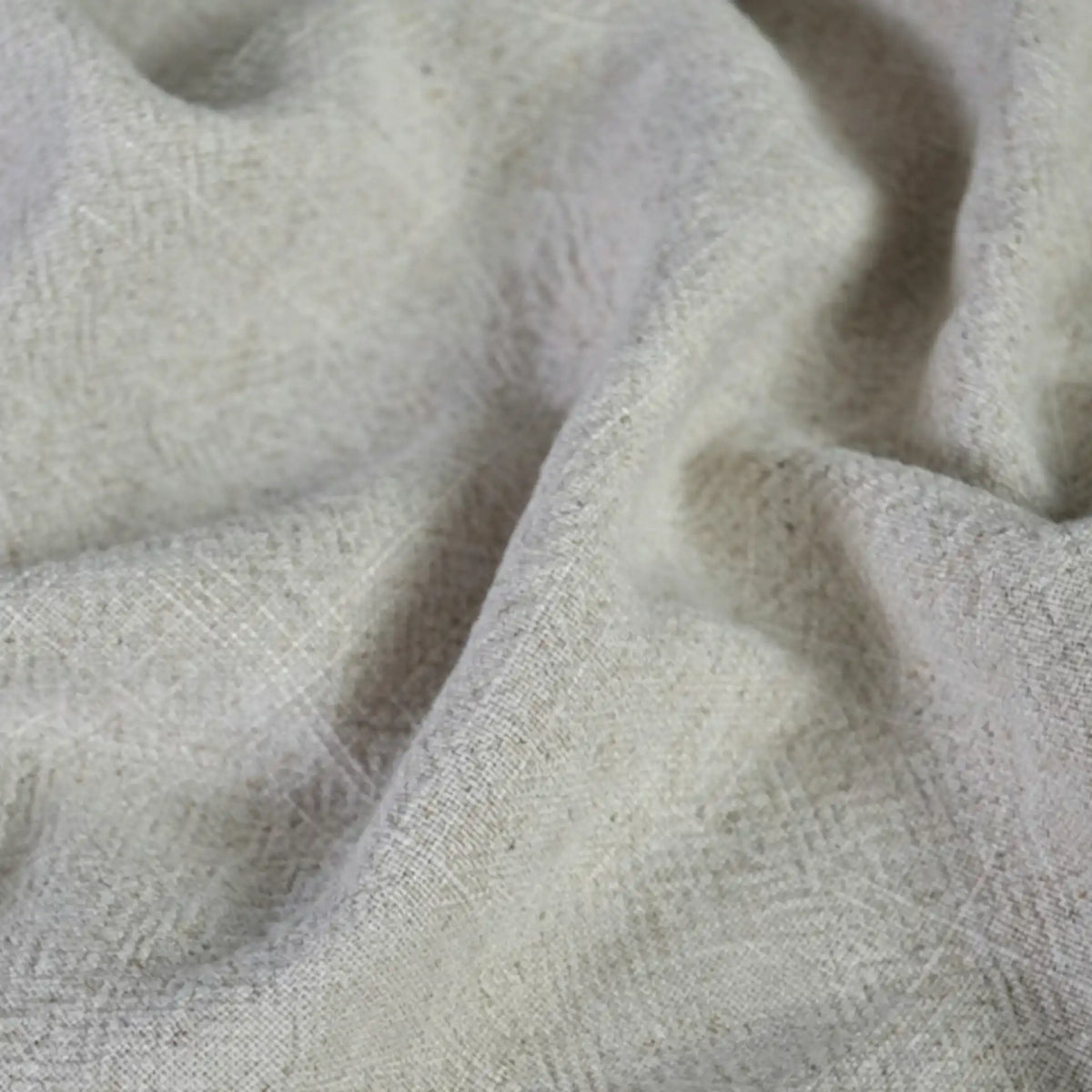 A close-up of Longan Craft’s Solid Color Rayon Linen Fabric by the yard, a thick washed slub viscose material with a soft, textured surface and visible woven fibers—ideal for dresses and clothing projects.