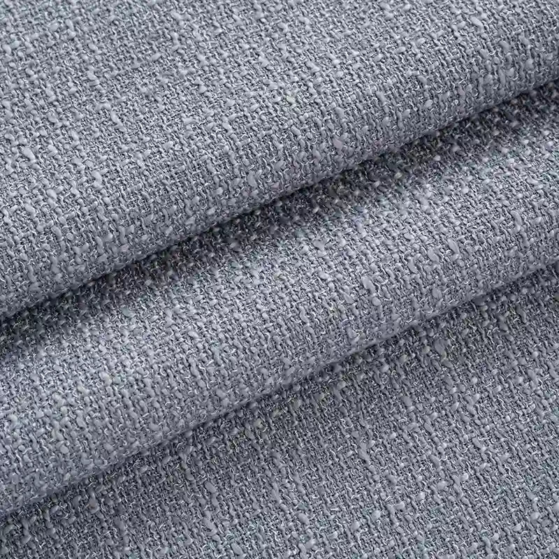 Close-up of Longan Craft Solid Color Tweed Fabric by the yard—a chic woven polyester textile for suits, featuring a subtle pattern and soft, slightly raised surface.