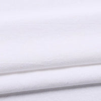 A close-up of Solid Color Washed Crepe Fabric by the yard from Longan Craft, made from 100% cotton, neatly folded to highlight its soft and textured surface—perfect for pants and other clothing projects.