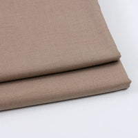 Two neatly folded pieces of Longan Craft Solid Color Wool Gabardine Fabric (Rayon Polyester Blended Twill), perfect for casual wear, are shown on a white background.