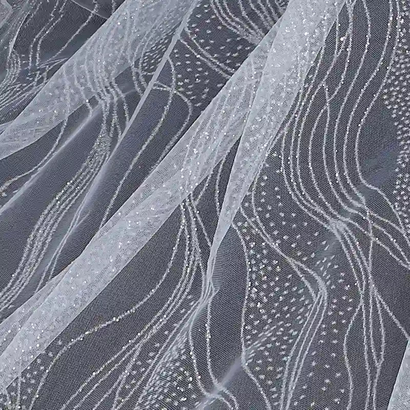 A close-up of Longan Craft's Sparkle Glitter Tulle Fabric by the yard, a multicolor, shiny, delicate tulle perfect for evening gowns with subtle shimmer and elegant texture.