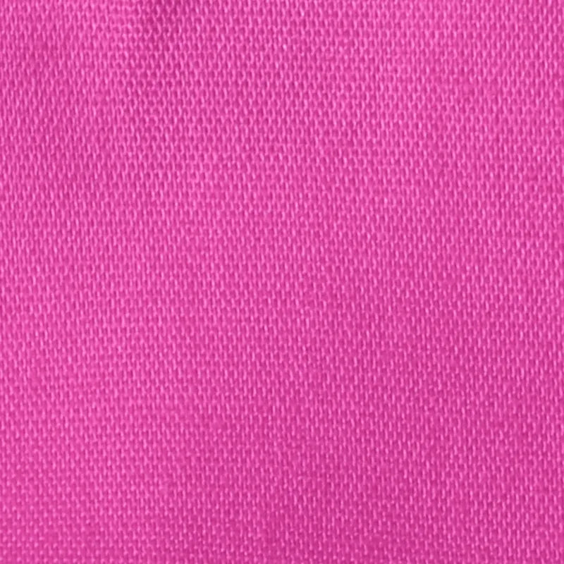 A close-up view of Longan craft Stretch Poplin Fabric By The Yard displays the detailed weave pattern of this pink cotton stretch poplin material, ideal for apparel and quilting.