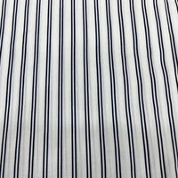 Close-up of Striped Cotton Lawn Fabric By The Yard from Longan Craft—features colorful printed stripes, ideal for airy summer shirting or dressmaking.