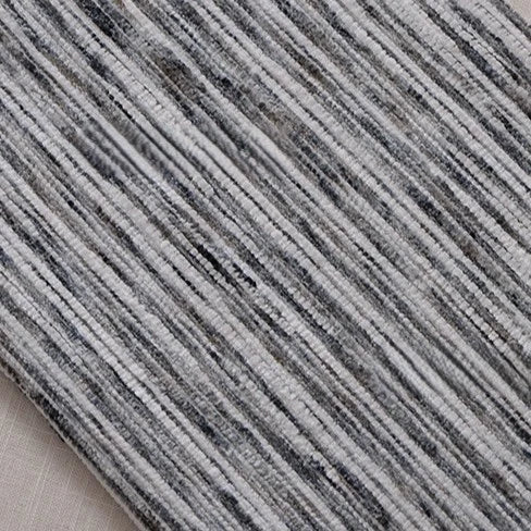 Close-up of Longan Craft’s Striped Jacquard Chenille Fabric By The Yard, a colorful and durable poly woven chenille upholstery material, shown at an angle and featuring irregular horizontal stripes for a dynamic look.